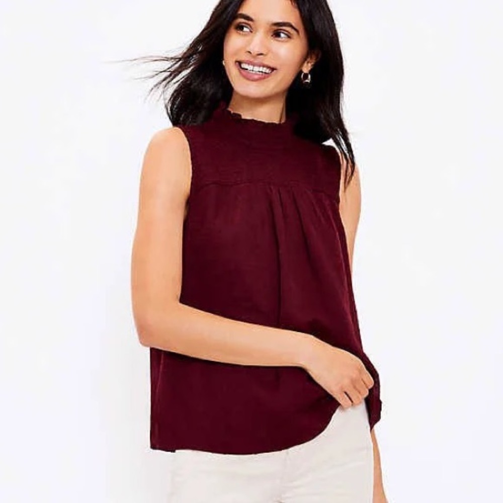 Loft Clip Dot Smocked Mock Neck Shell Top. Size small in color bold bordeaux.